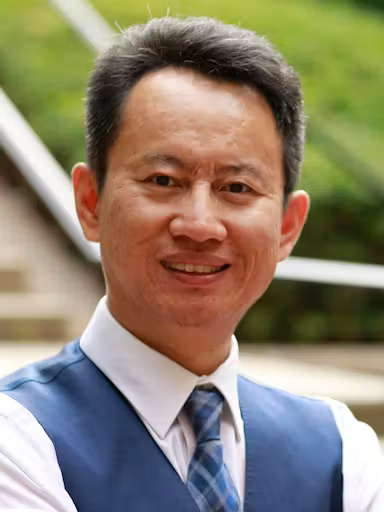 A headshot photo of Xiaoming Zhai.