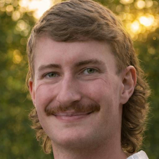 Headshot of Dr. Ethan J. Poncelet