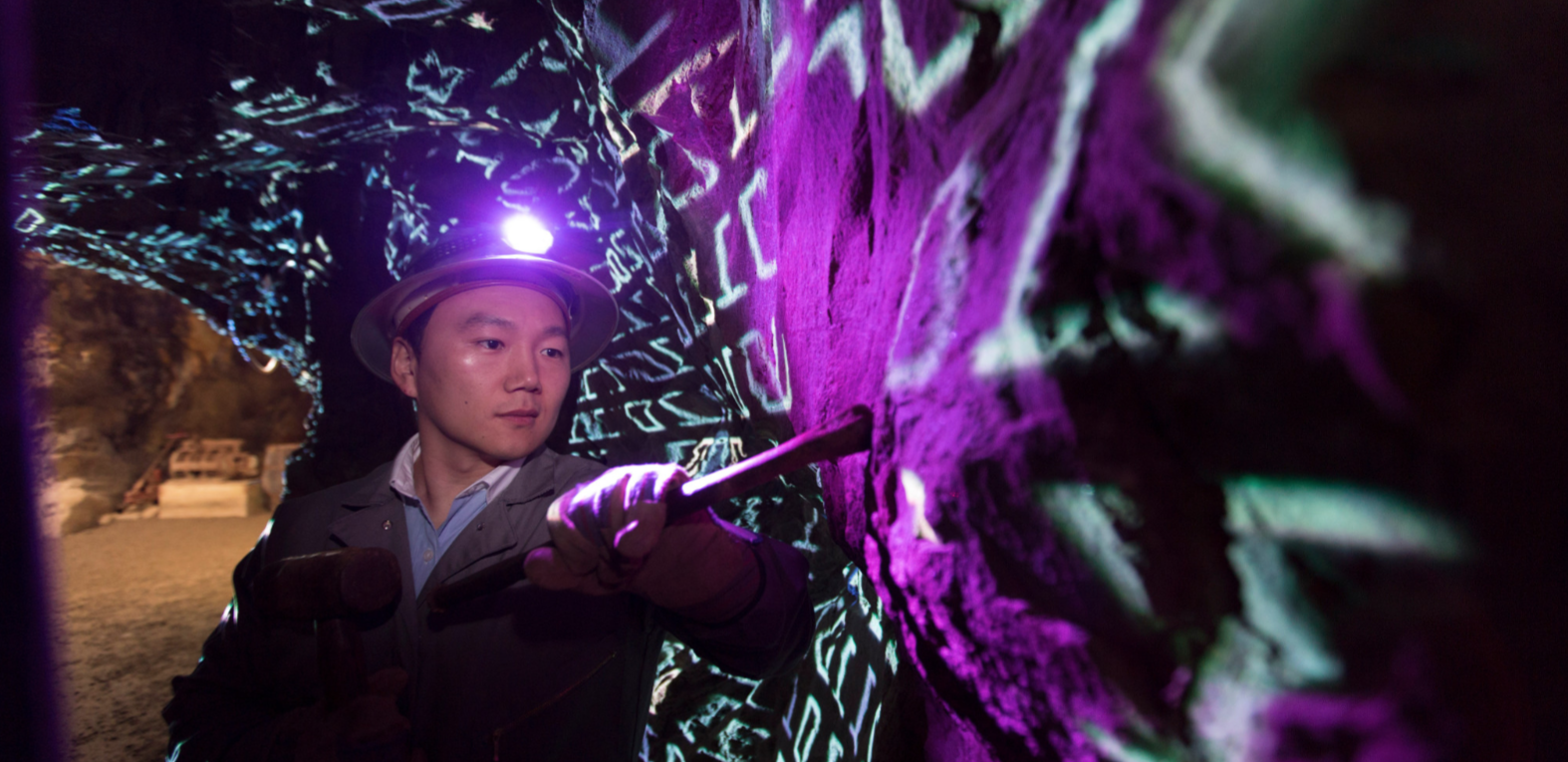 Environmental portraits of Jaewoo Lee 'data mining' in a gold mine.