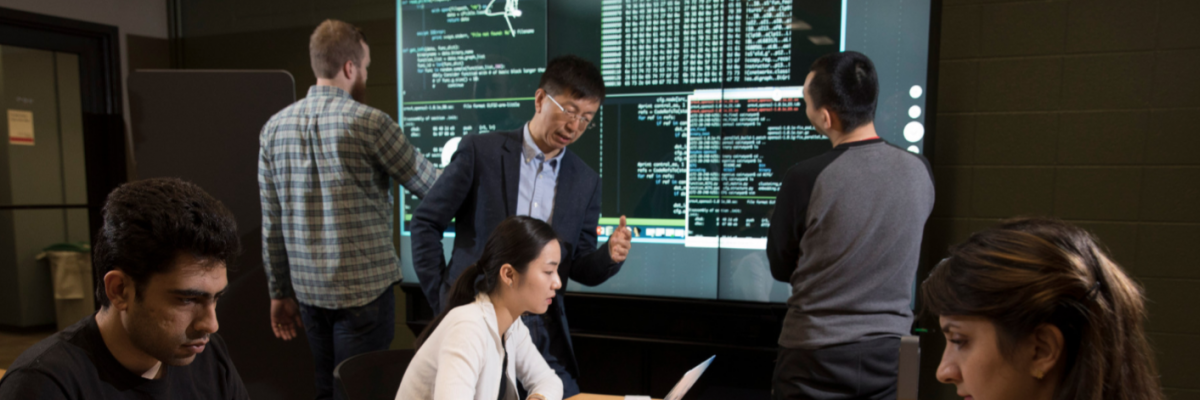Kang Li with Students in Science Library iWall Room