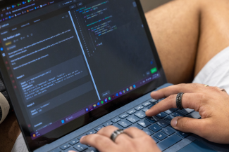 Computer science student at work