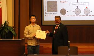 Yucheng Shi accepts the Graduate Student Research Award presented by the SoC director Dr. Gagan Agrawal