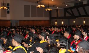 A crowd of SoC students and parents looking on at the commencement.